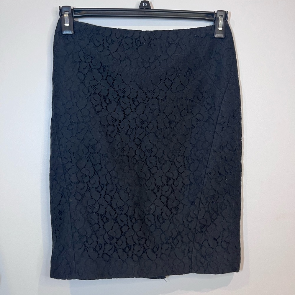 The limited black lacy straight midi skirt size 0 with slit and zipper